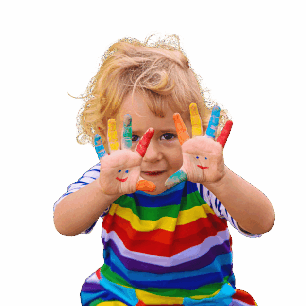 Young child in a rainbow-striped shirt showing painted hands with smiley faces, with fingers covered in different colors.